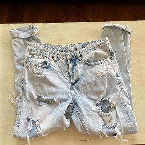 Distressed acid wash boyfriend jeans